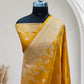 Haldi with Golden Zari Work and Rose Buti Design Satin Silk Banarasi Saree
